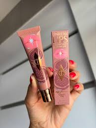 روغن لب آبرسان و براق شارلوت تیلبری مدل Unreal Lips اورجینال
